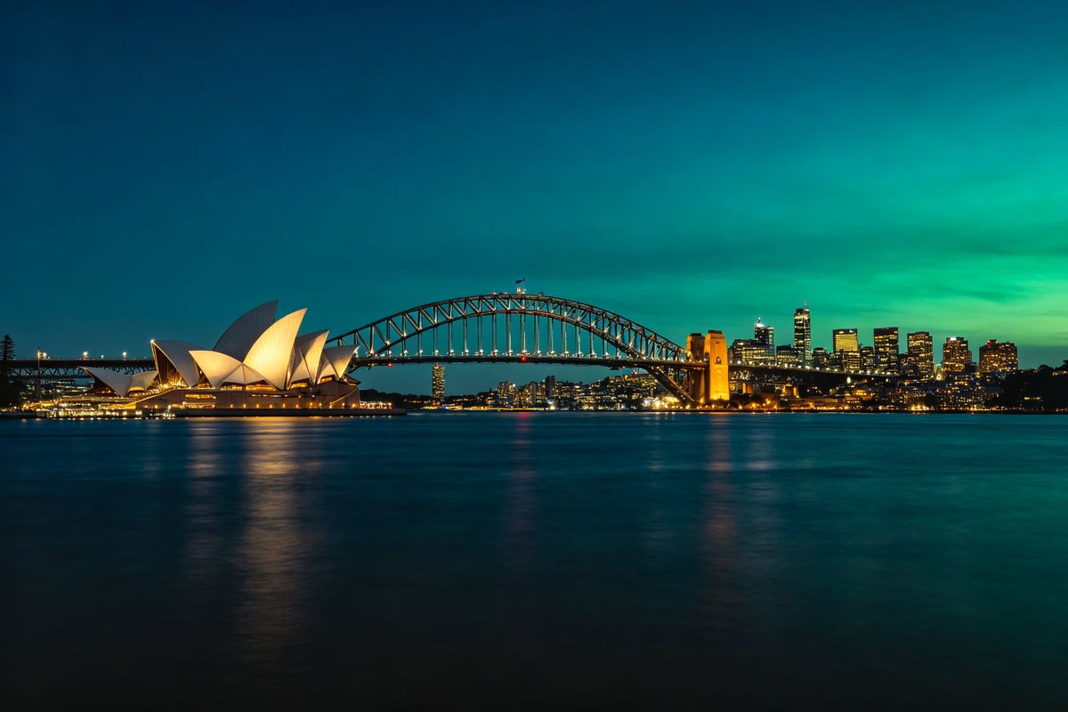 Sydney Harbour with Opera House and Harbour Bridge at dusk